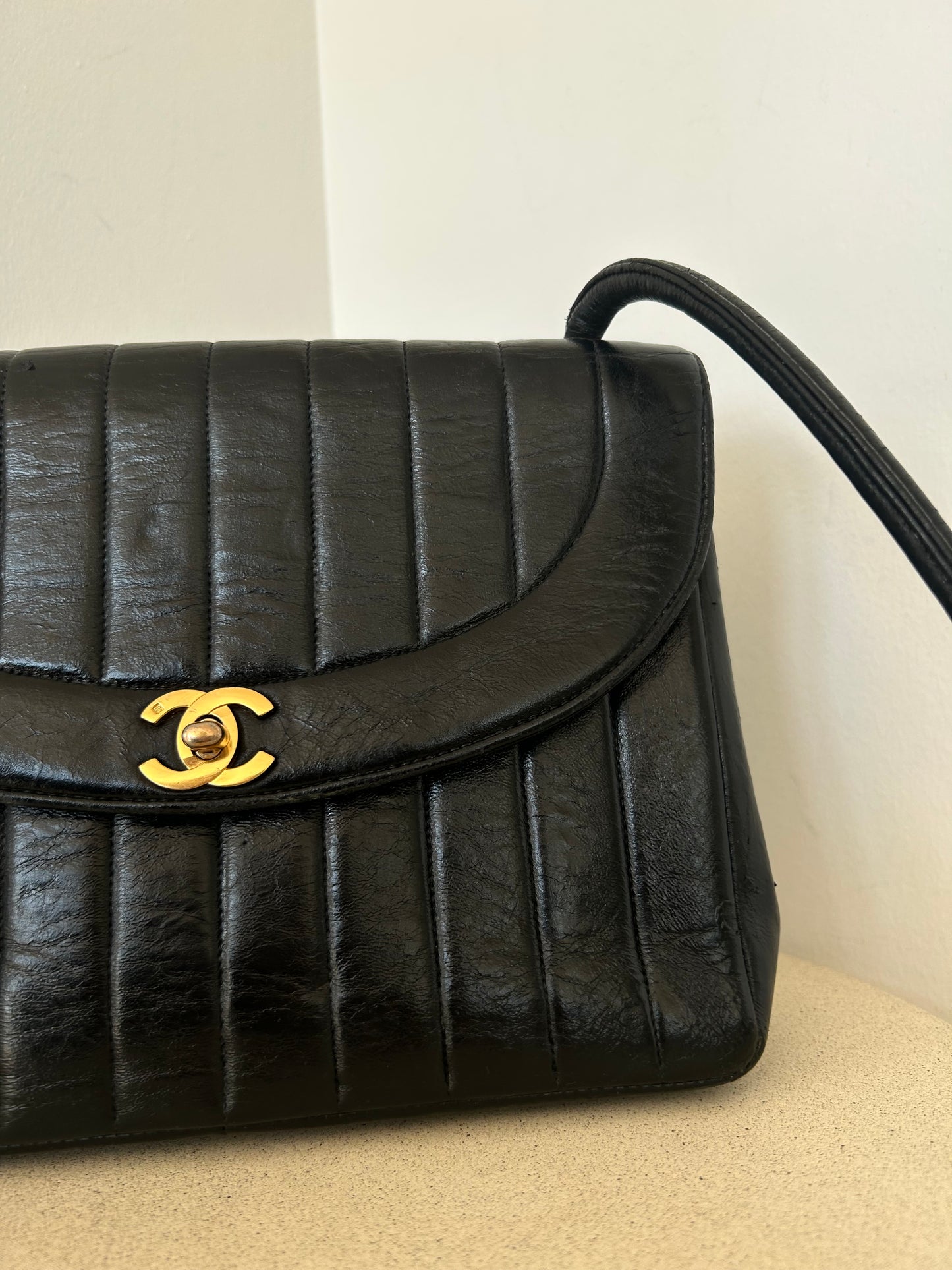 Chanel vertical quilt bag