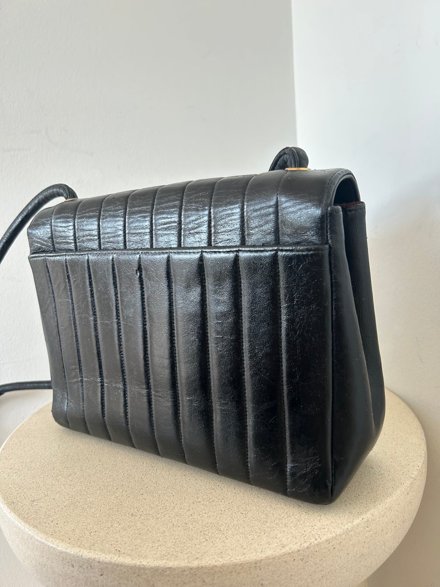 Chanel vertical quilt bag