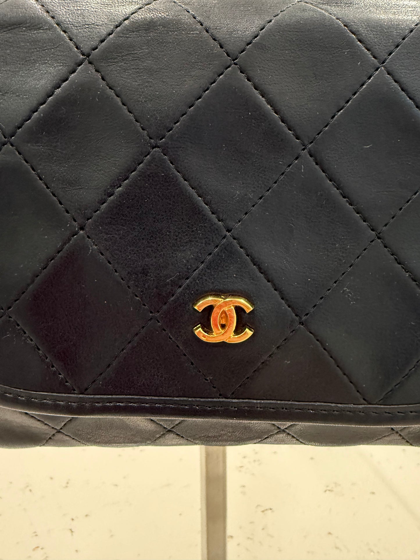 Chanel Quilted Round Flap Bag