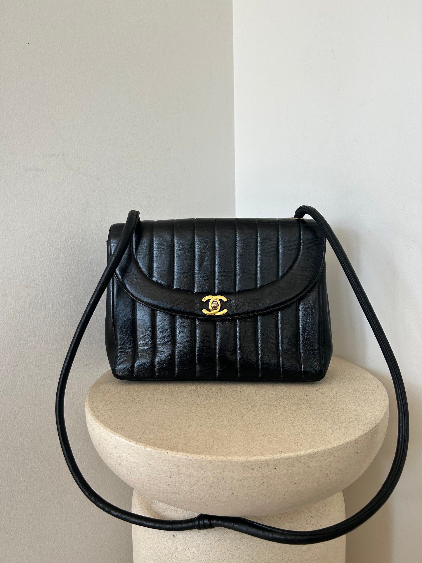 Chanel vertical quilt bag