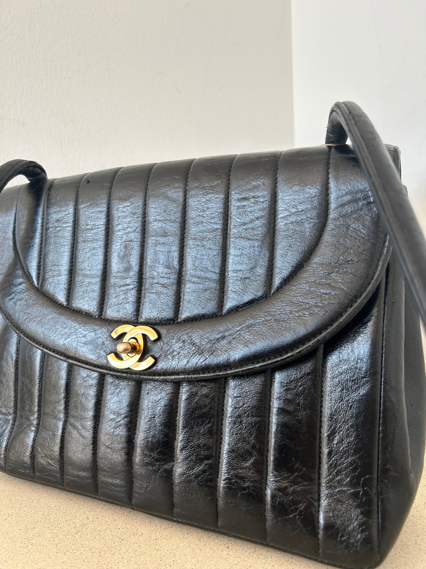 Chanel vertical quilt bag