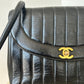 Chanel vertical quilt bag