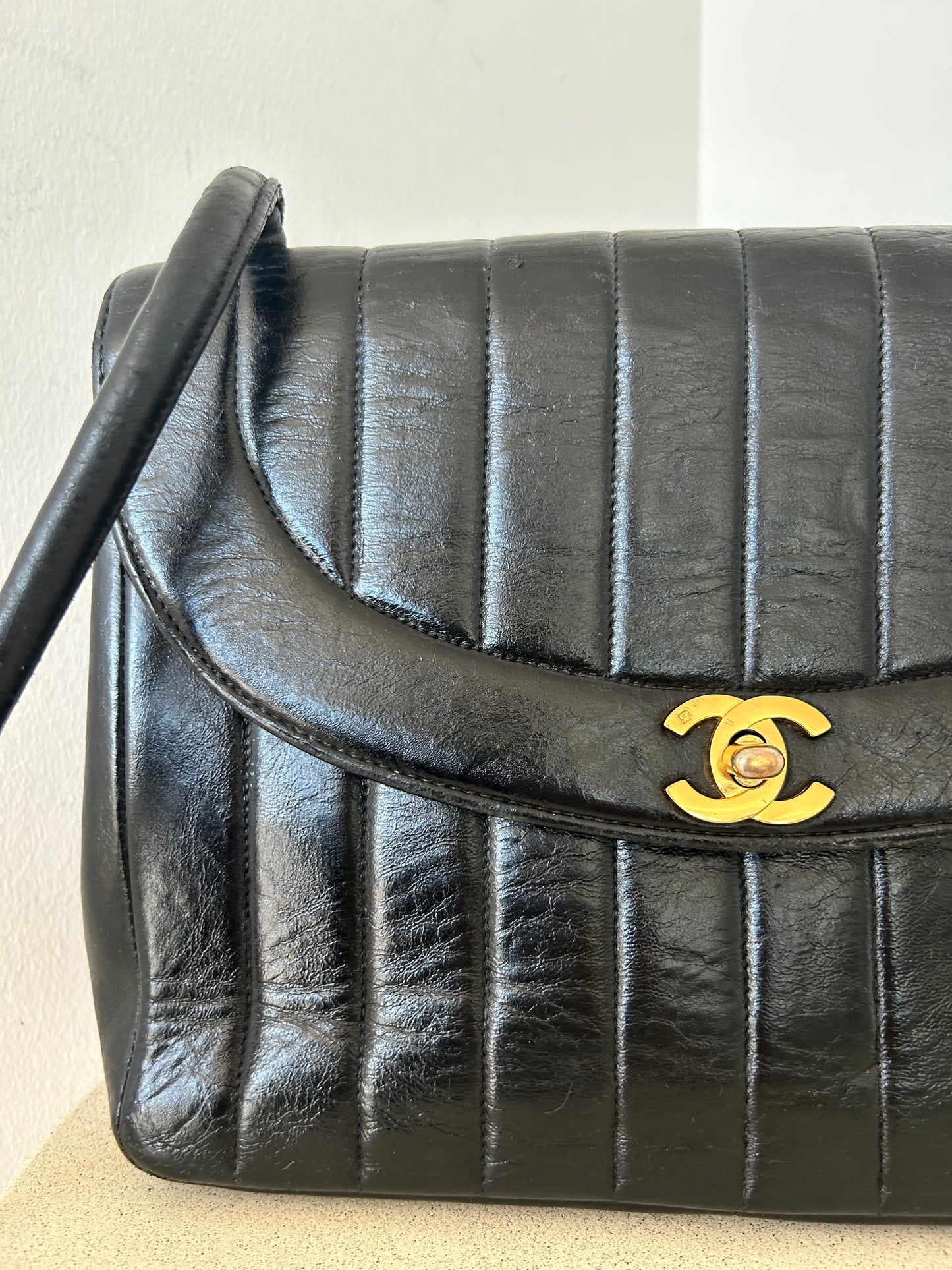 Chanel vertical quilt bag