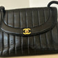 Chanel vertical quilt bag