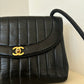 Chanel vertical quilt bag