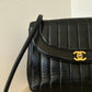 Chanel vertical quilt bag