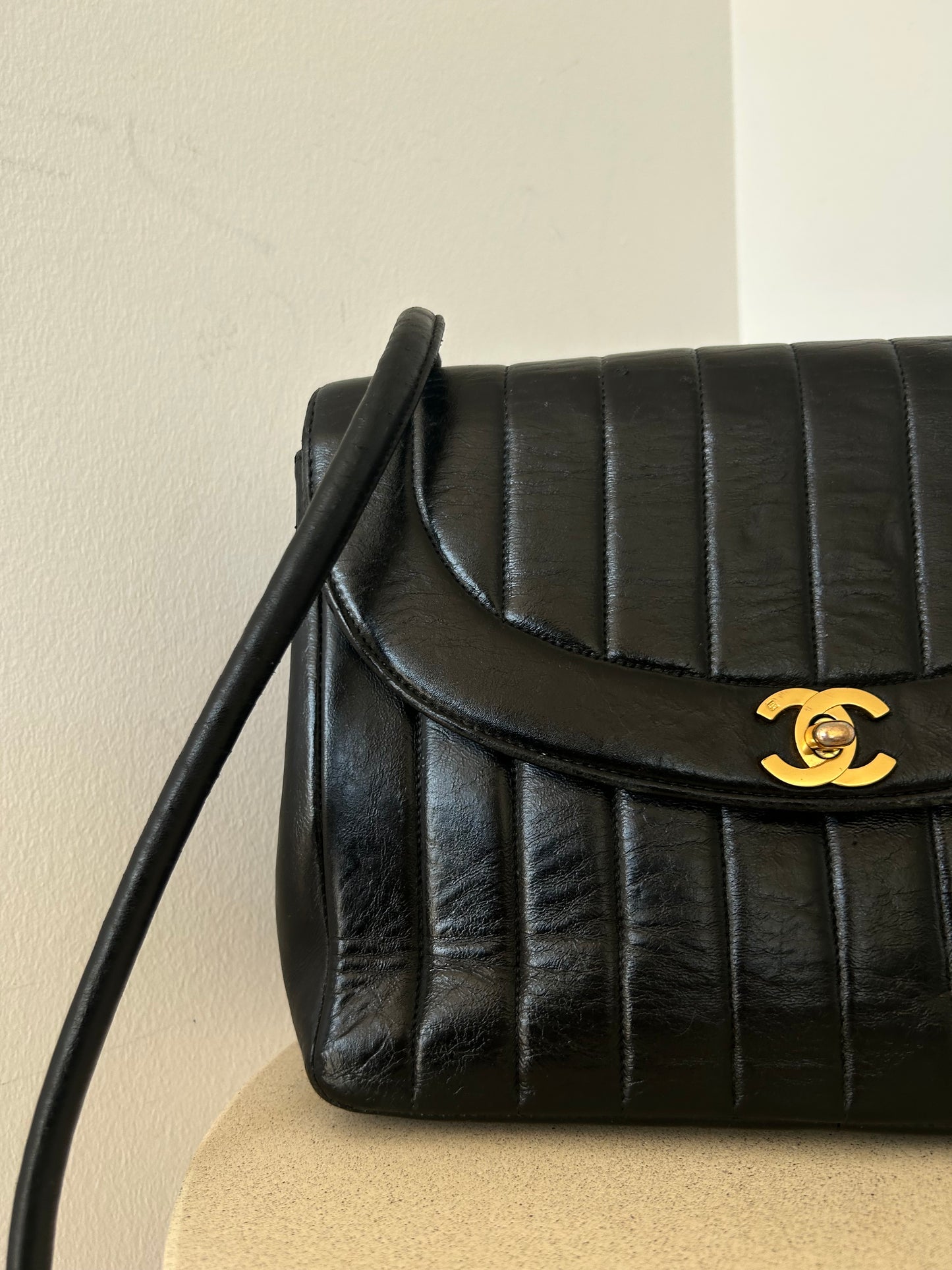 Chanel vertical quilt bag