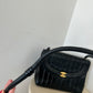 Chanel vertical quilt bag