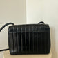 Chanel vertical quilt bag