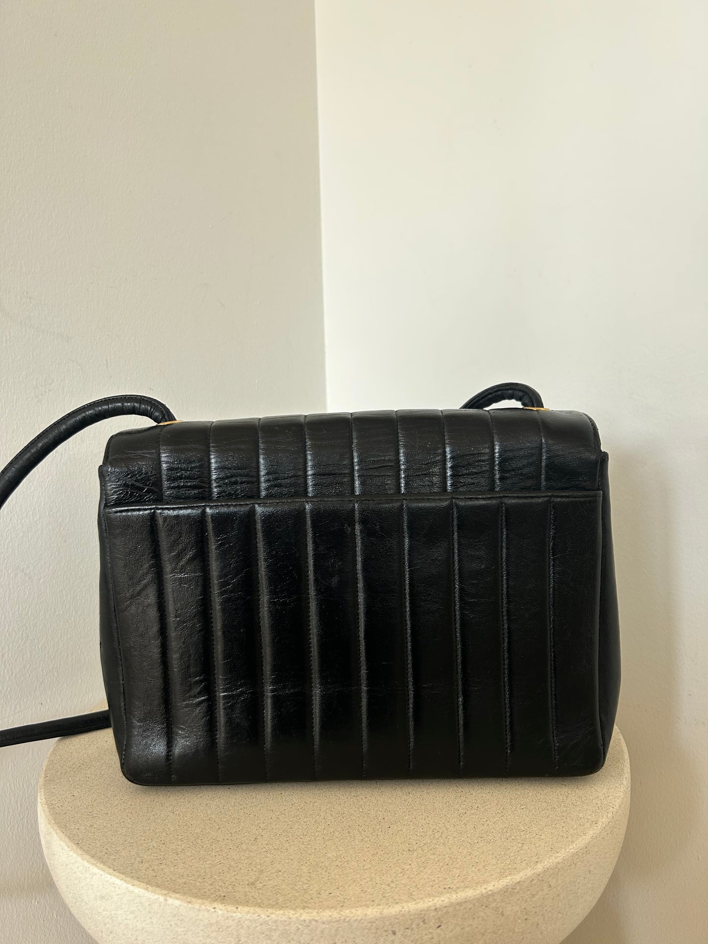 Chanel vertical quilt bag