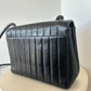 Chanel vertical quilt bag