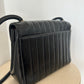 Chanel vertical quilt bag