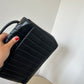 Chanel vertical quilt bag