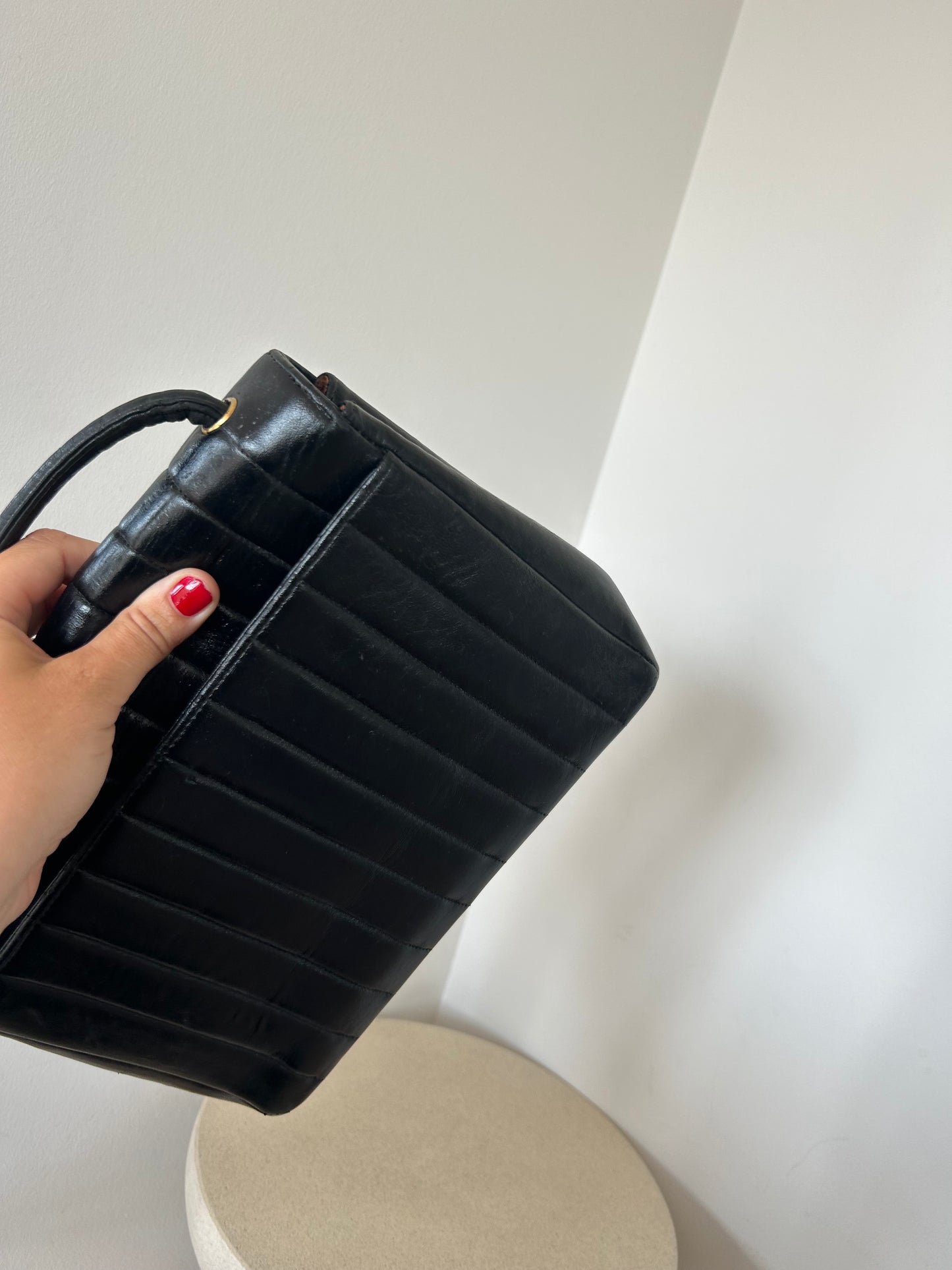 Chanel vertical quilt bag