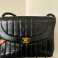 Chanel vertical quilt bag