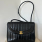 Chanel vertical quilt bag