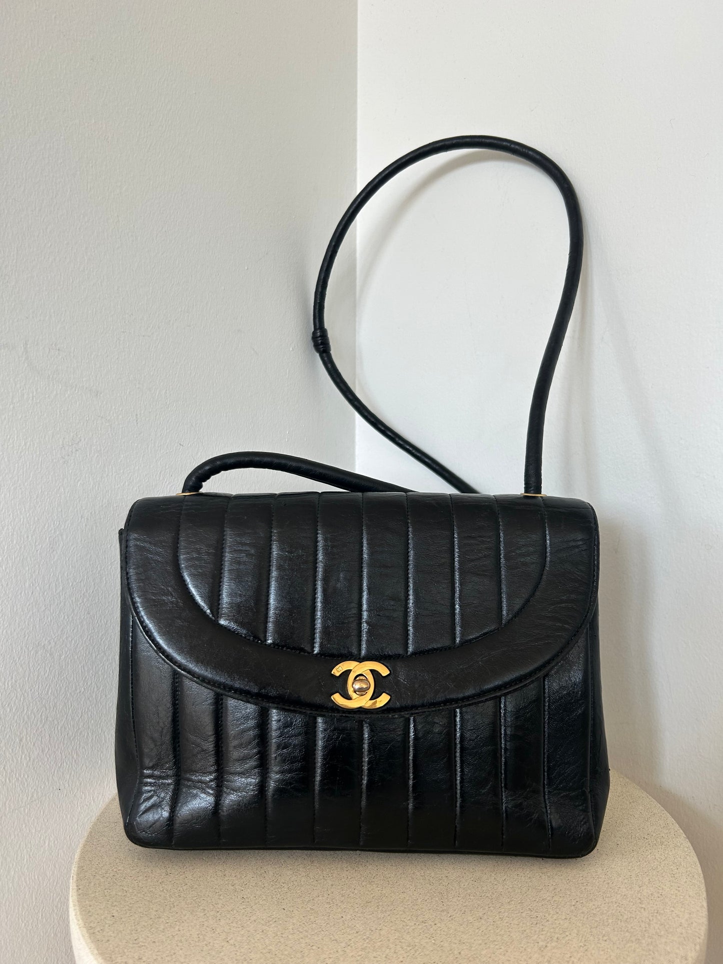 Chanel vertical quilt bag