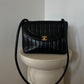 Chanel vertical quilt bag