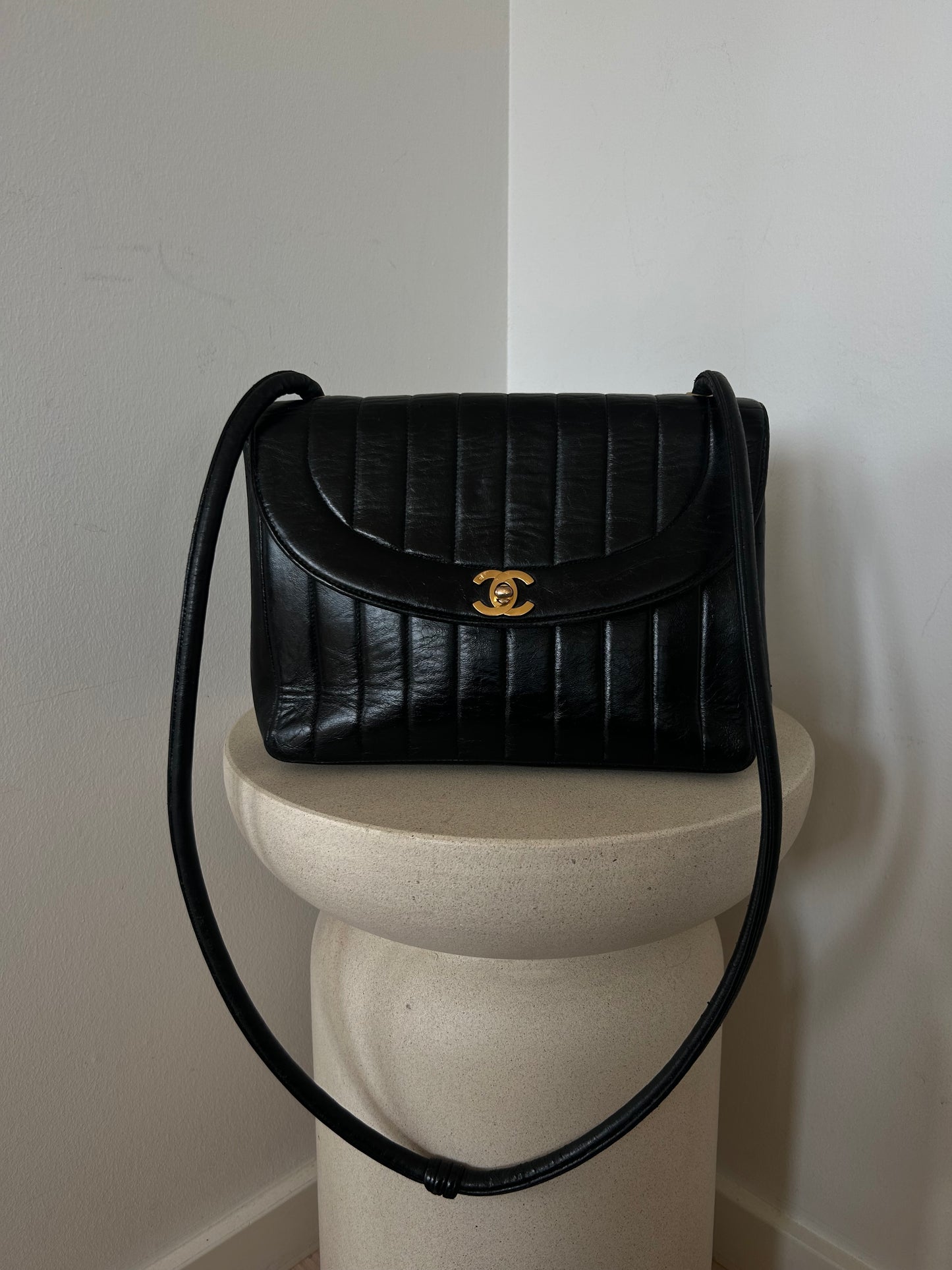 Chanel vertical quilt bag